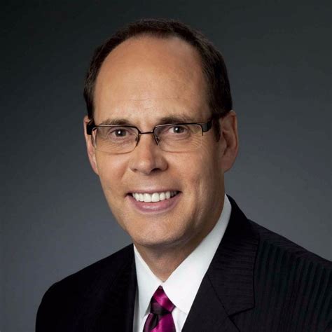 how old is ernie johnson